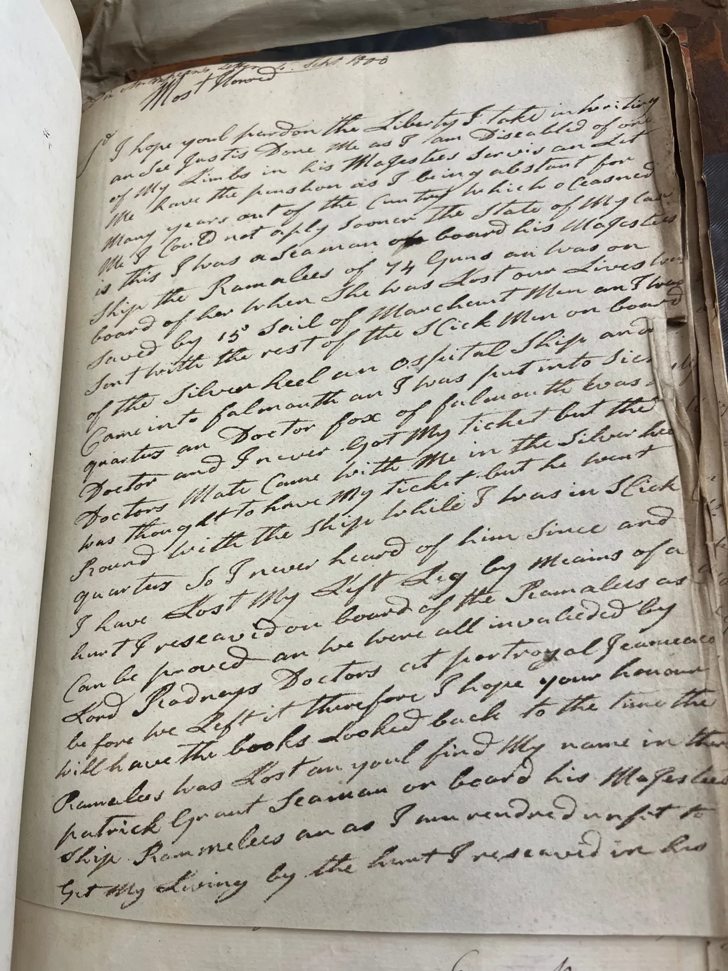 Handwritten letter written on paper in cursive black script