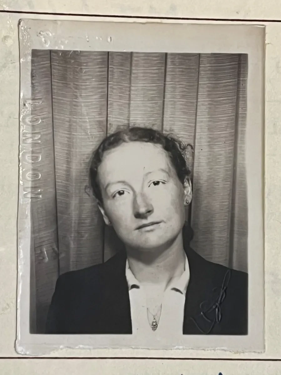 A photographic passport-style photo of Nina from her seamen's record
