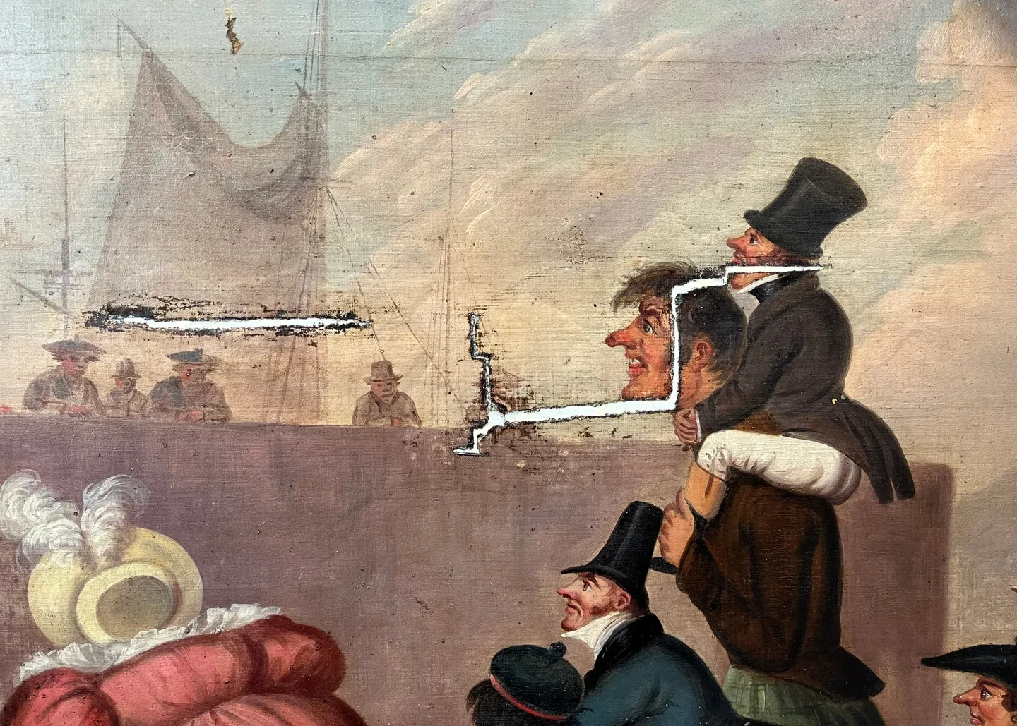 A close-up view of a painting with two tears in the canvas. These cut horizontally across the scene, showing a humorous representation of a man giving a piggy back to another in a top hat, with a sailing ship in the background