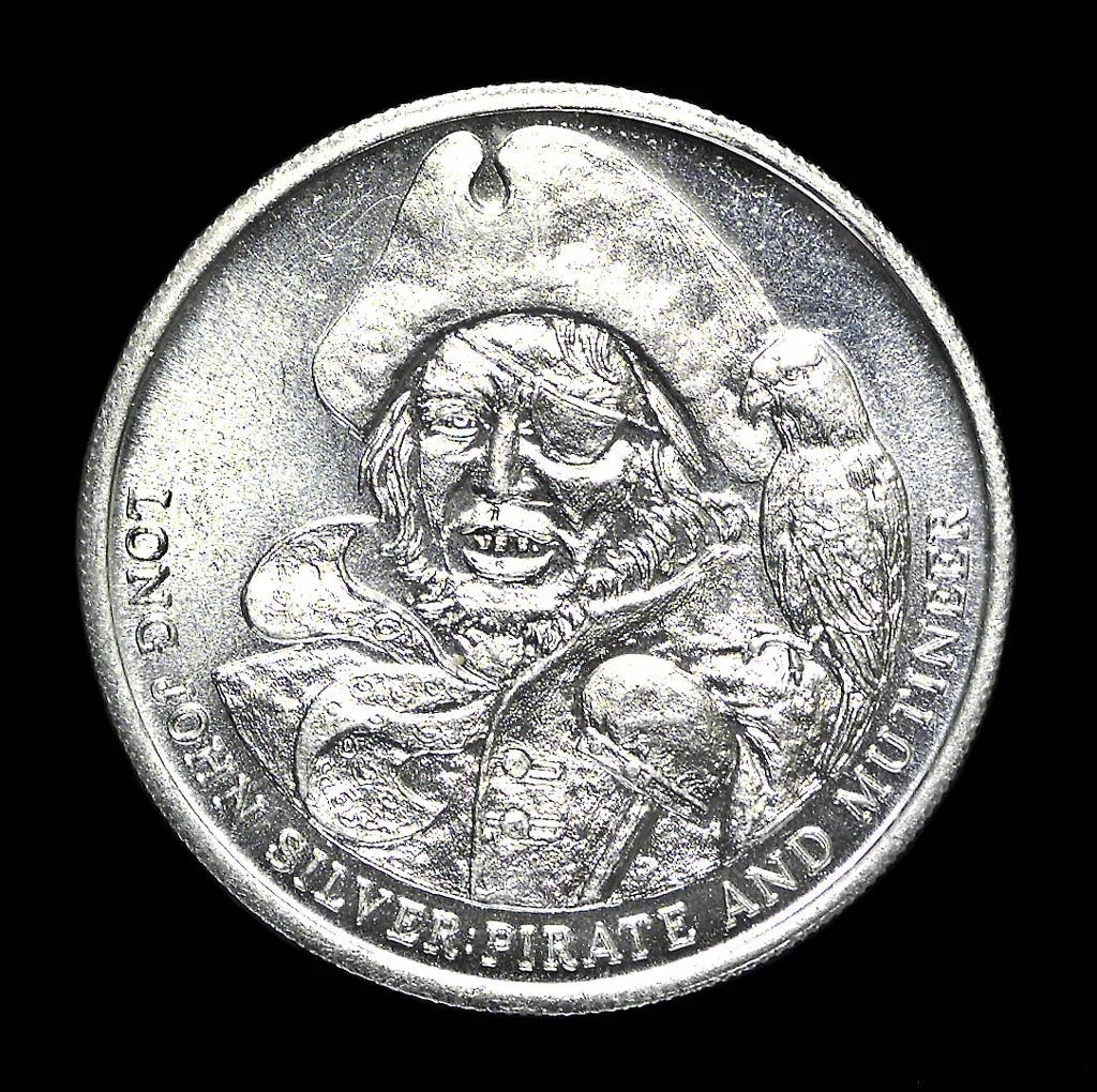 Silver coin depicting Treasure Island character Long John Silver in a cocked hat with a parrot on his shoulder
