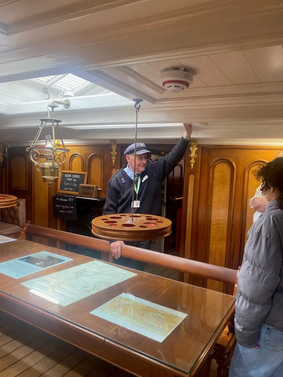 Photo of Graeme in the captain's cabin on Cutty Sark