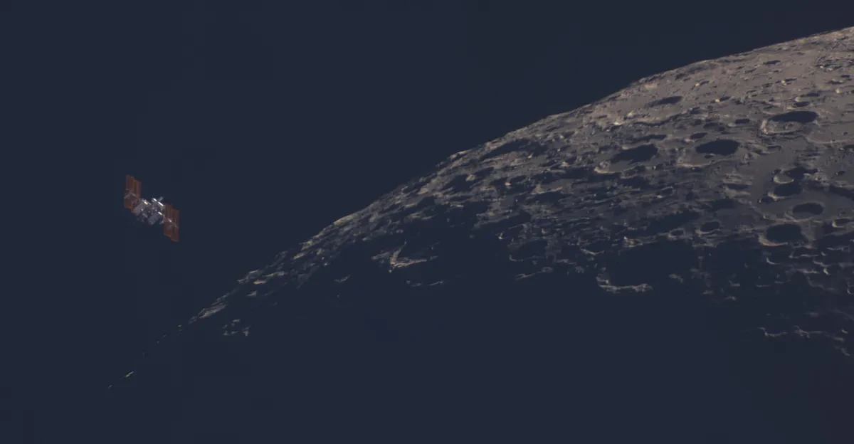 Photo showing the cratered lunar surface in semi-darkness, with the International Space Station passing close above