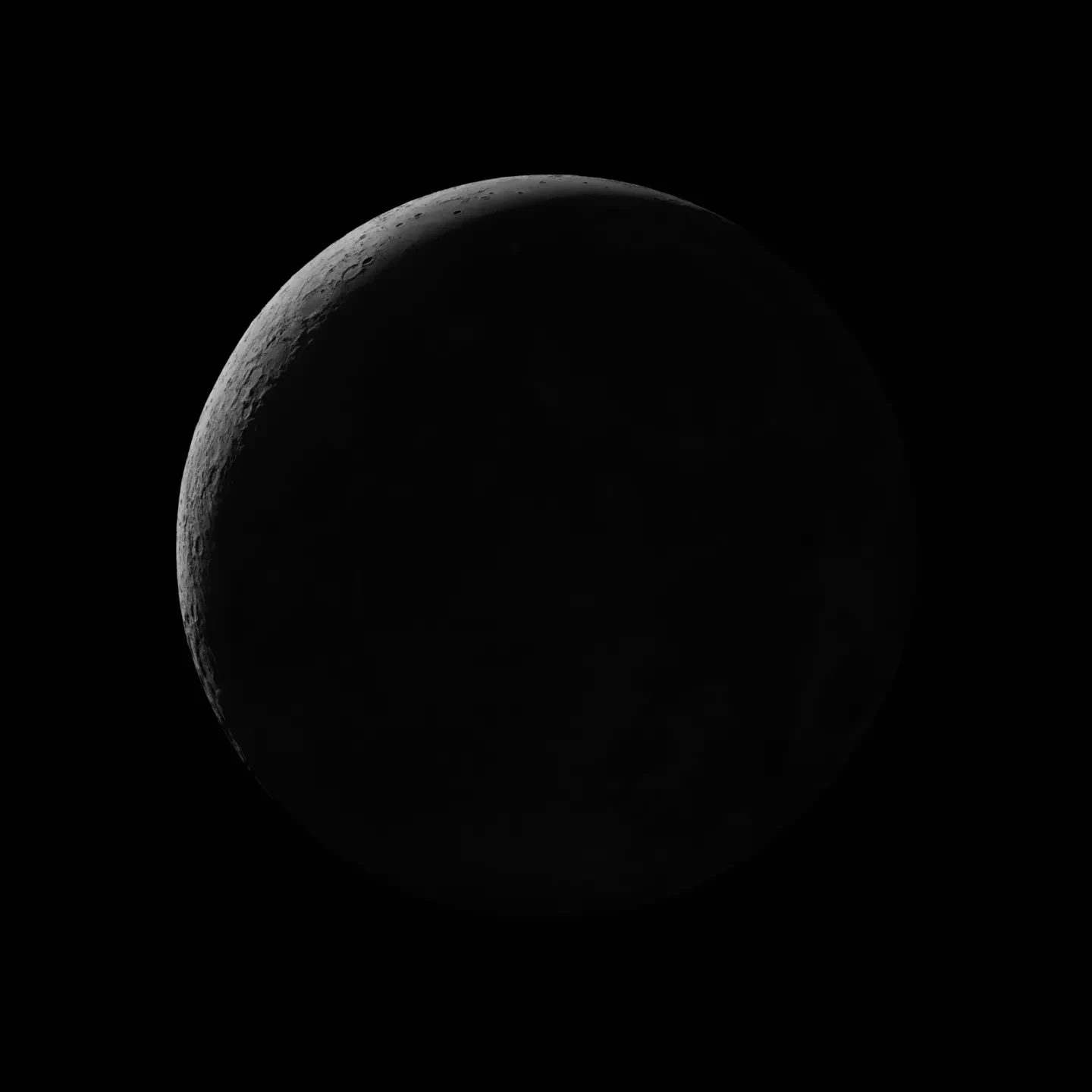 Dark photograph of a crescent Moon