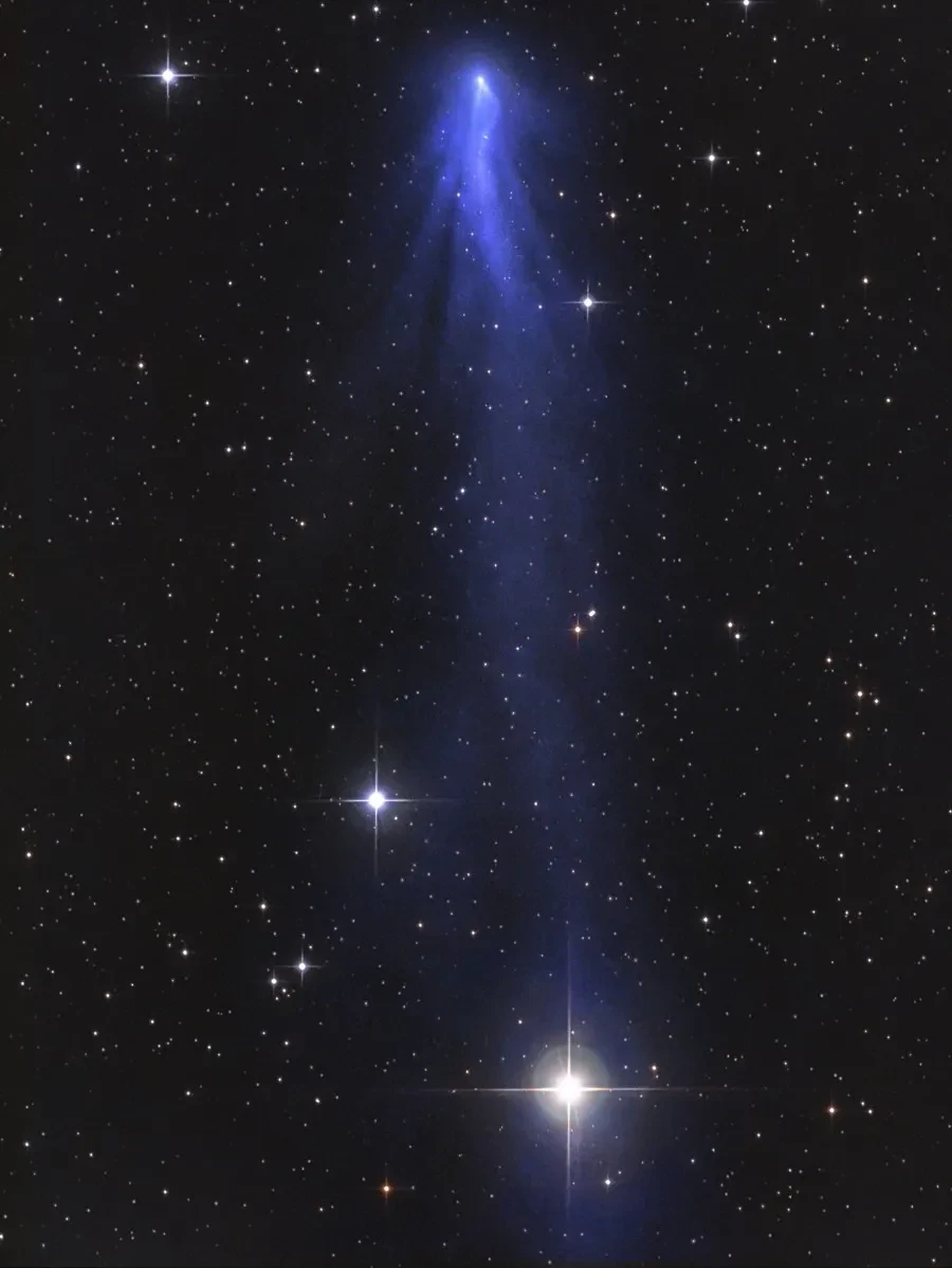 Astronomy photograph of comet tails.