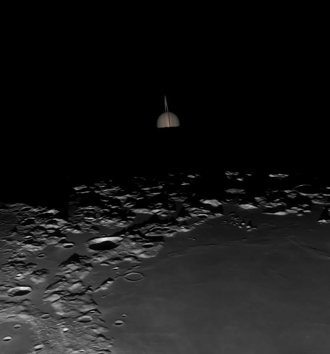 Dark square photo depicting top limb of the Moon with craters visible and Saturn small in the middle of the image half obscured by the Moon