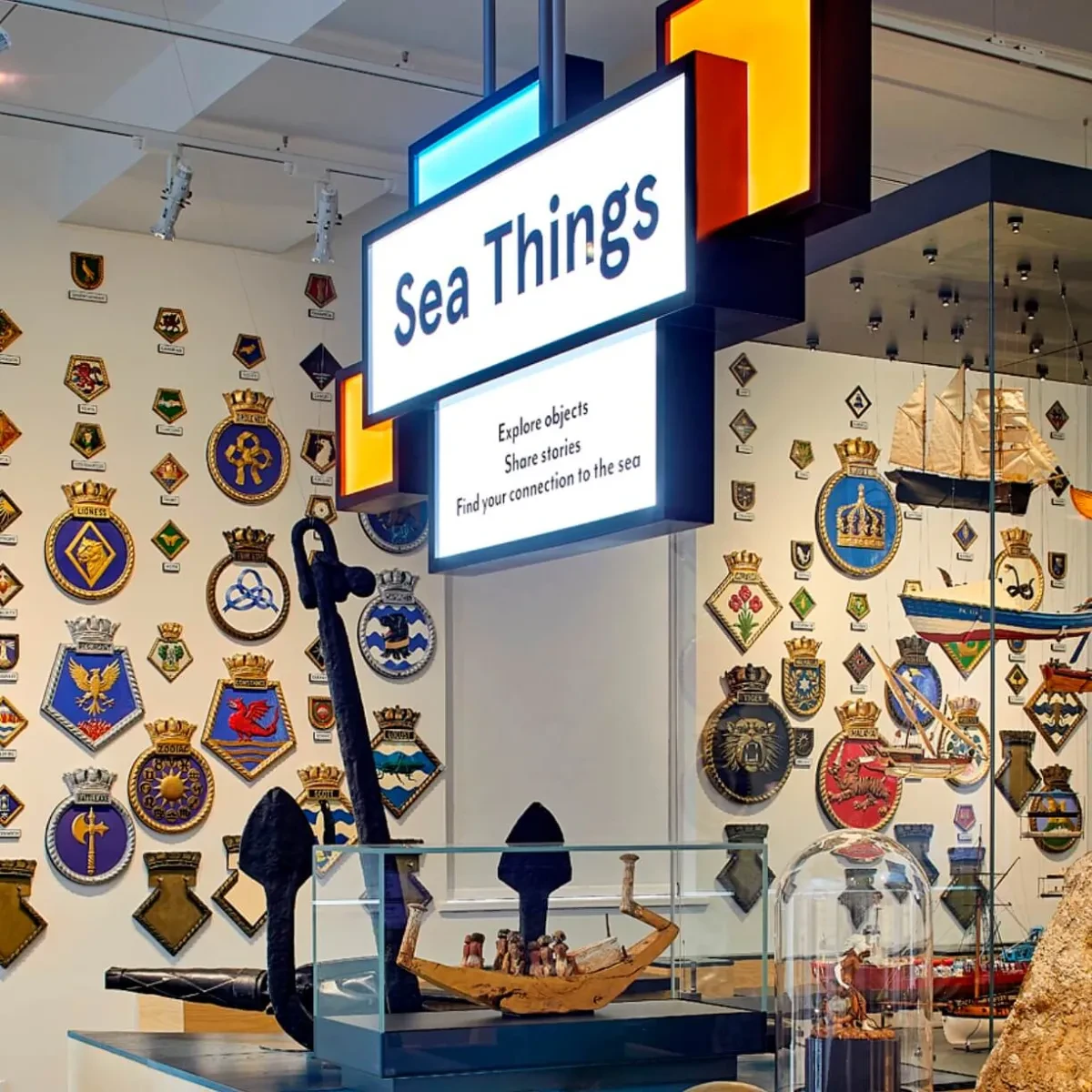 Exhibits and a sign in the Sea Things gallery.