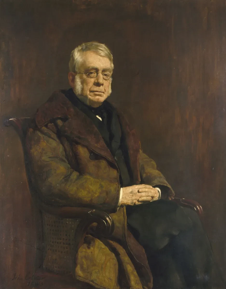 Painting of George Biddell Airy wearing a heavy coat and sitting down