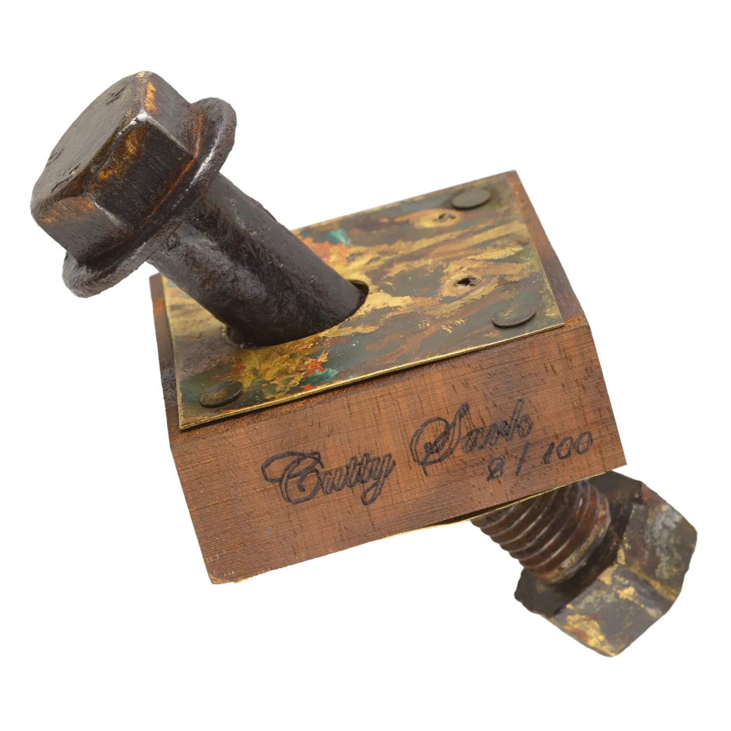 Photo of a square piece of wood with a bolt through it