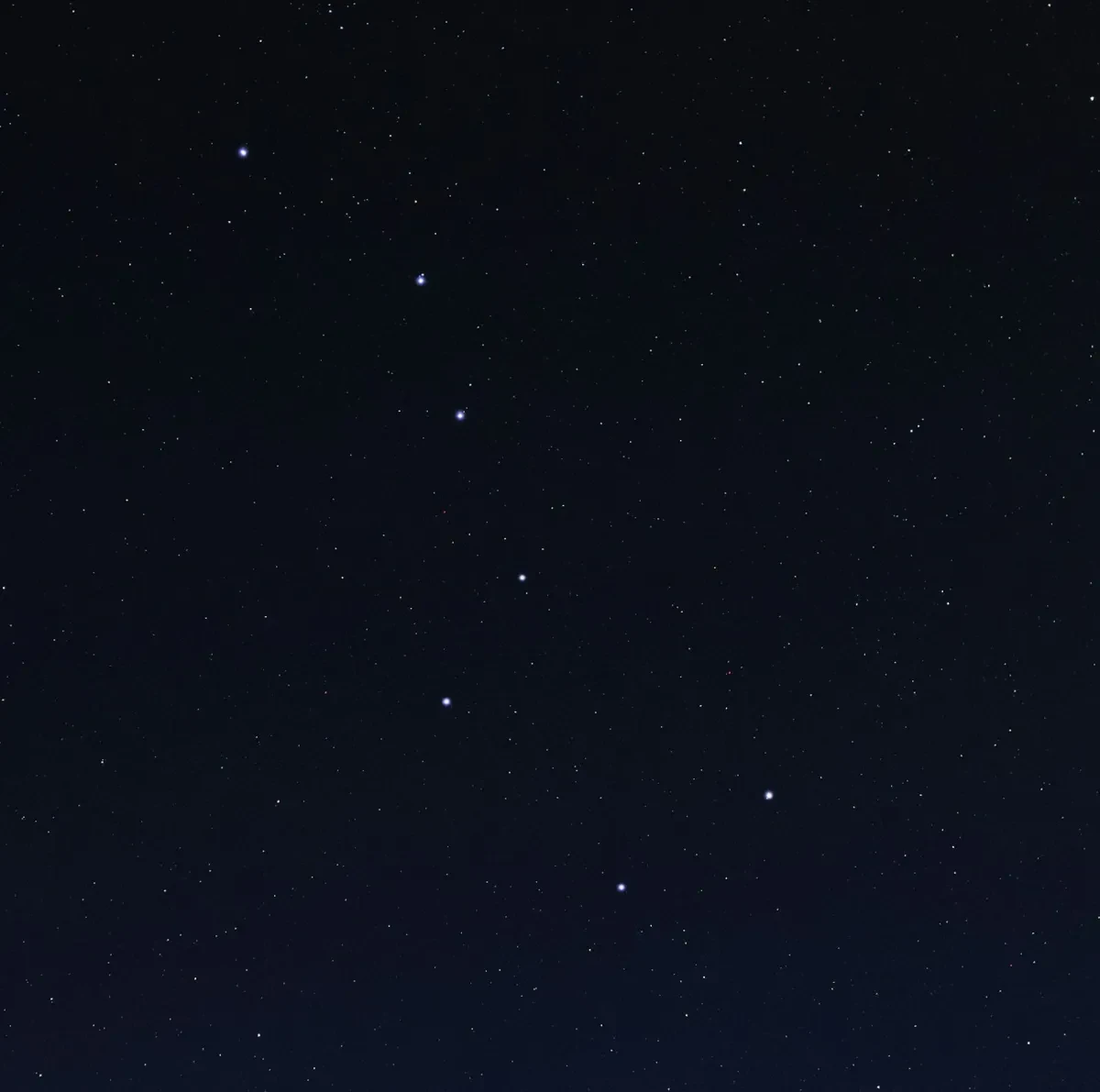 Image of dark night sky with 7 bright stars in a shape that resembles a diagonal saucepan with a handle